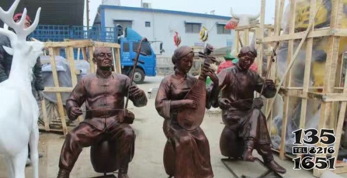 街头卖艺人物铜雕图片