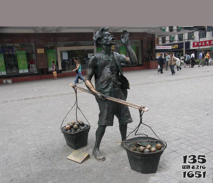 步行街卖苹果的小贩人物铜雕图片