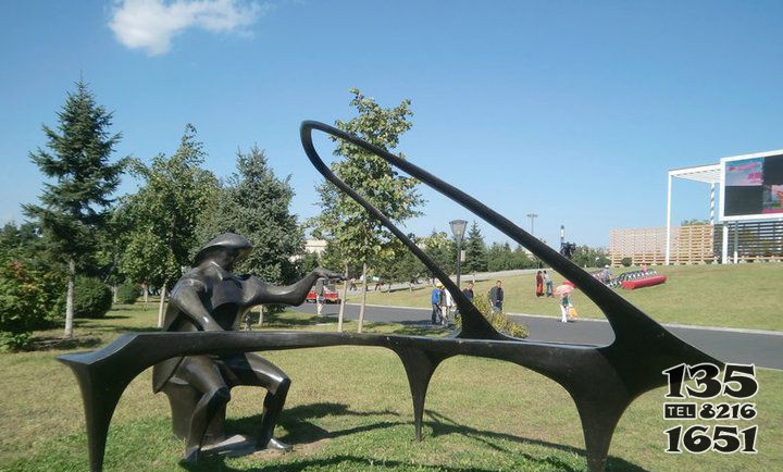 公园弹钢琴抽象人物铜雕图片