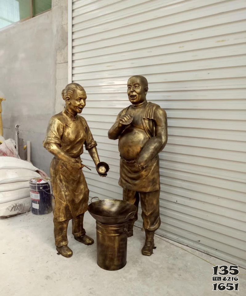 卖饭的老夫妻人物铜雕 图片