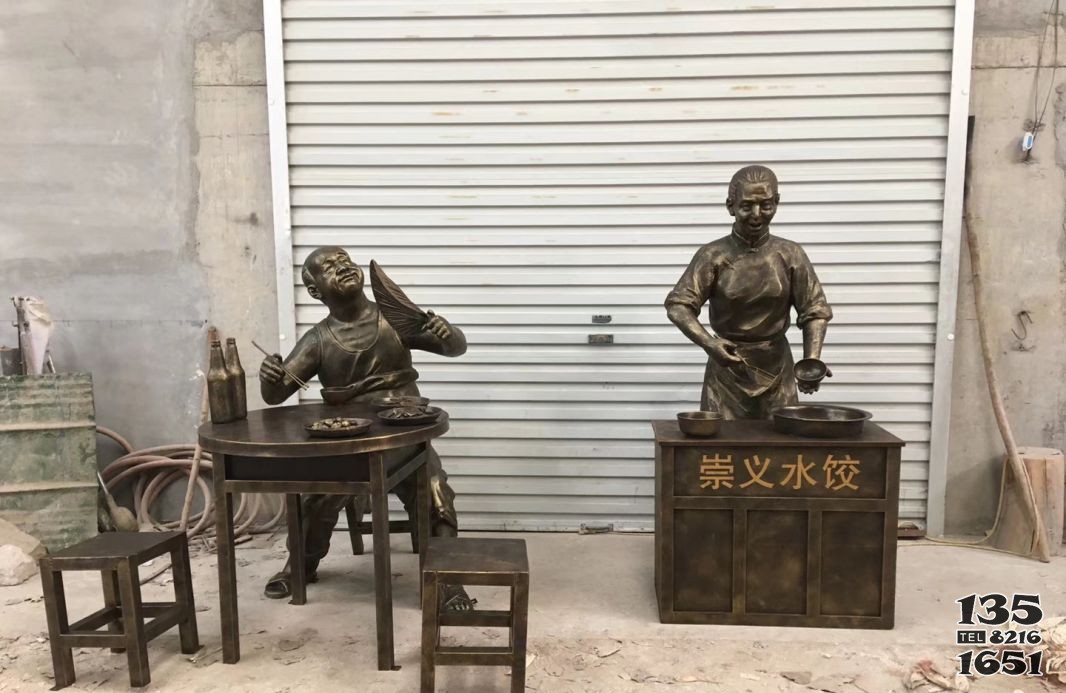 铜雕商业街水饺人物雕塑图片