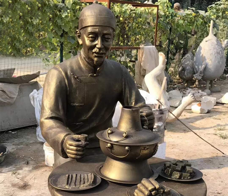 吃火锅的古代人物铜雕图片