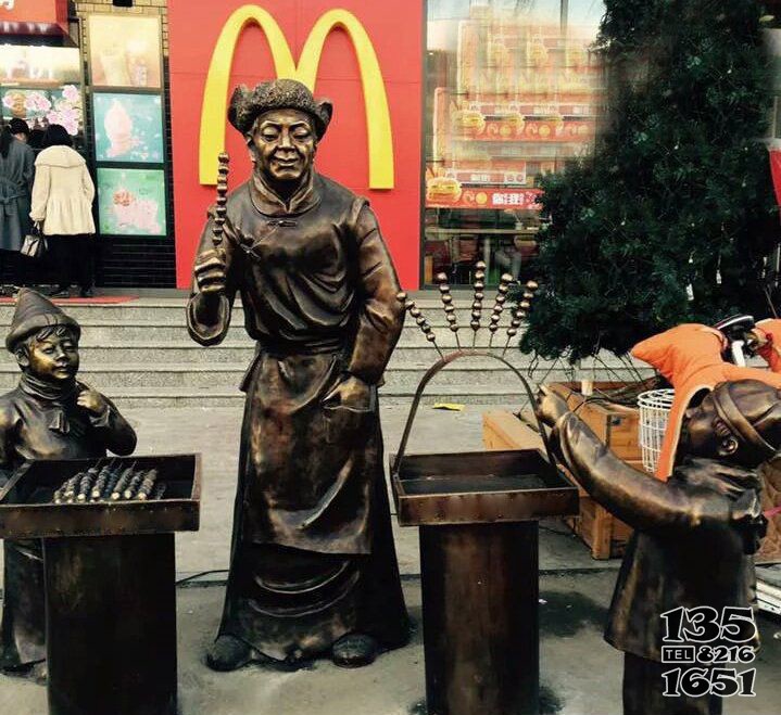 步行街卖糖葫芦的人物铜雕图片